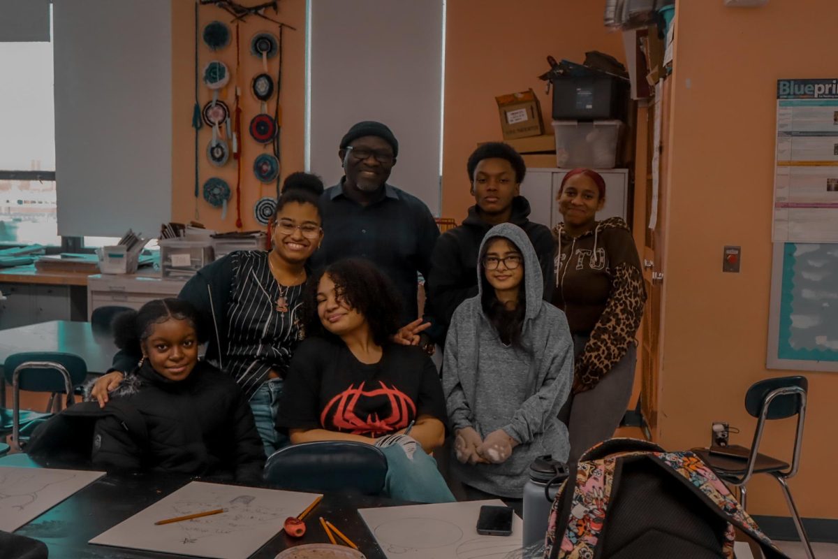 Art club members: Stacy Jean 11th grade, Sanaa Greaves 11th grade, Sariya Brooks 11th grade, Chandra Datadeen 12th grader, Xavier Fletcher Johnson 12th grader, Stephanie Munoz 11th grader, with their adviser and art teacher Mr. Tolu