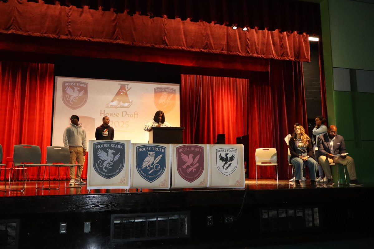 Principal Brown delivering the opening announcements during the whole school House Draft.