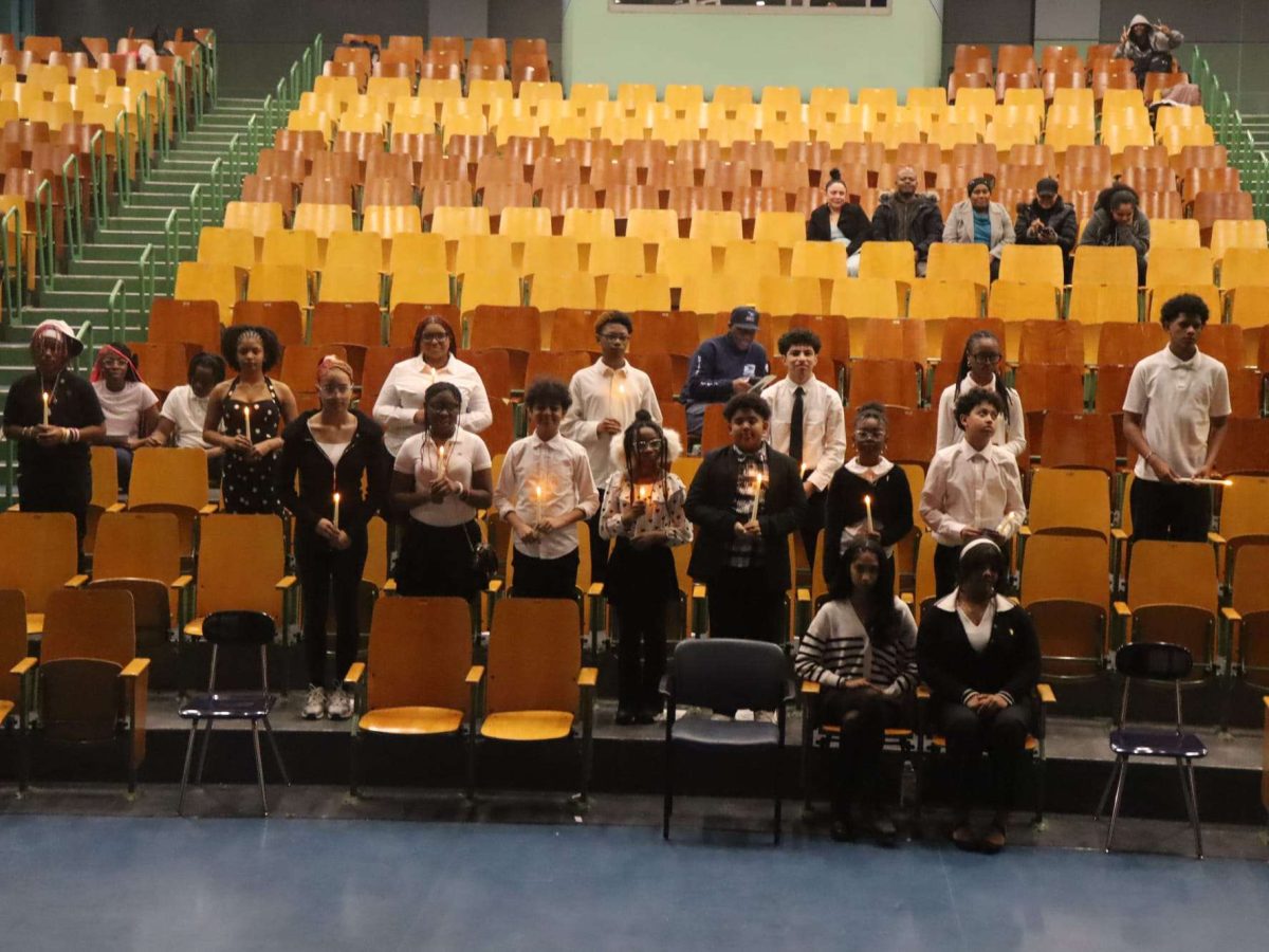 New NHS and Junior Honor Society inductees, family, and NHS student council members Jaleayah Castro(10th grade) and Dayoina Singh(12th grade)